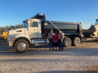 Sharon Yarbrough and the JD's Septic Service team with their dump truck